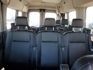2023 Ford Transit Passenger XL with VIN 1FBAX9C85PKC11039, listed as a Copart auction lot 88472055 with 8,569 mi miles and Salvage Title. Bid and sale history available at DreamBid. Image 10.