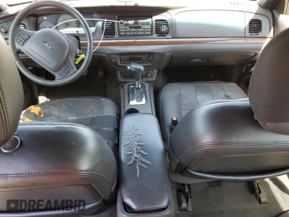 2004 Ford Crown Victoria LX z VIN 2FAFP74W44X112942, wystawiony jako Copart lot #50484665 z przebiegiem 248 480 mil mil oraz Szkoda całkowita • Salvage title. Historia ofert i sprzedaży dostępna na DreamBid. Obrazek 8.