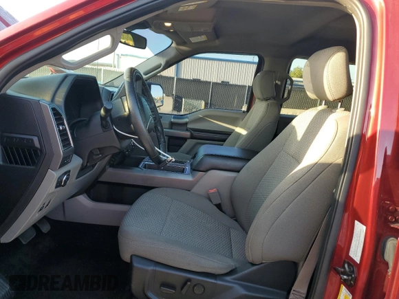 2019 Ford F-150 XL with VIN 1FTEW1E48KFA78516, listed as a Copart auction lot 65382775 with 70,810 mi miles and Salvage title. Bid and sale history available at DreamBid. Image 7.