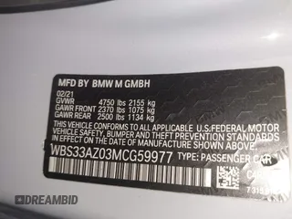 2021 BMW M4 Competition with VIN WBS33AZ03MCG59977, listed as a IAAI auction lot 41012387 with 50,572 mi miles. Bid and sale history available at carsss.com. Image 9.