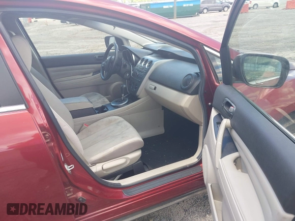 2011 Mazda CX-7 i SV z VIN JM3ER2A56B0396740, wystawiony jako IAAI lot #42194180 z przebiegiem 245 160 mil mil oraz . Historia ofert i sprzedaży dostępna na DreamBid. Obrazek 5.