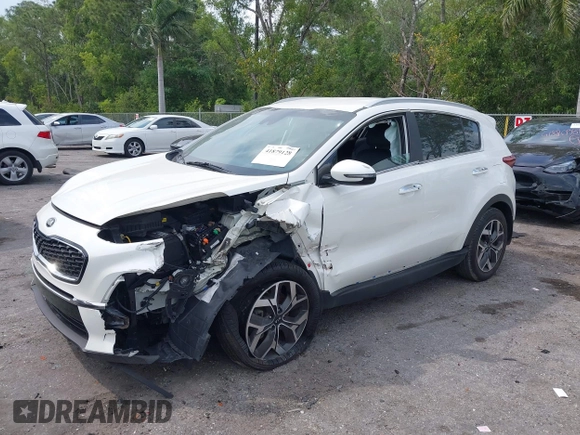 2021 Kia Sportage EX with VIN KNDPN3AC5M7856515, listed as a IAAI auction lot 41879128 with 56,537 mi miles and . Bid and sale history available at DreamBid. Image 2.