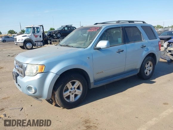 2008 Ford Escape Hybrid with VIN 1FMCU59H98KC31885, listed as a IAAI auction lot 42631198 with 369,266 mi miles and . Bid and sale history available at DreamBid. Image 2.