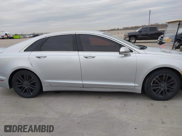 2015 Lincoln MKZ with VIN 3LN6L2J98FR618486, listed as a IAAI auction lot 41328946 with 167,211 mi miles and . Bid and sale history available at DreamBid. Image 13.
