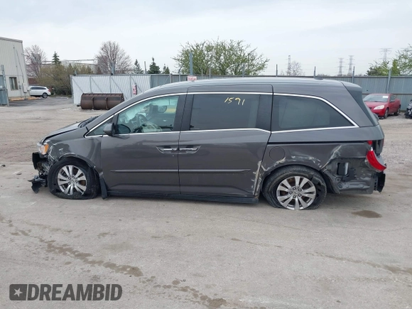 2014 Honda Odyssey EX-L with VIN 5FNRL5H62EB006346, listed as a IAAI auction lot 42061591 with 179,994 mi miles and . Bid and sale history available at DreamBid. Image 14.