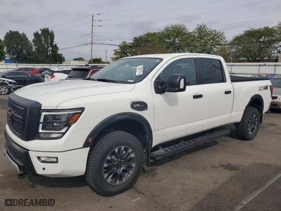 2024 Nissan Titan XD PRO-4X with VIN 1N6AA1FB1RN111525, listed as a Copart auction lot 72861574 with NaN miles and Salvage Title. Bid and sale history available at carsss.com. Image 1.