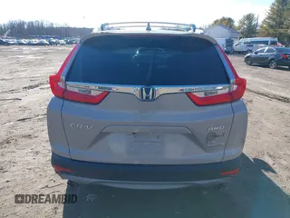 2017 Honda CR-V Touring with VIN 5J6RW2H94HL013536, listed as a IAAI auction lot 41577317 with 97,132 mi miles. Bid and sale history available at carsss.com. Image 16.