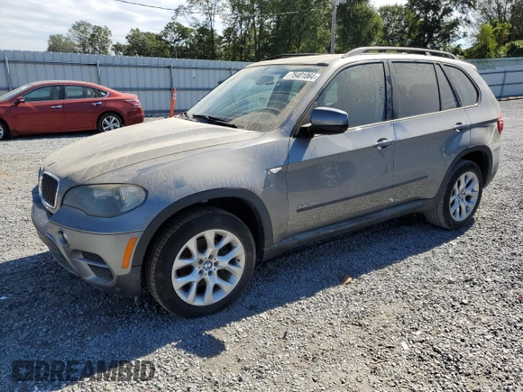 2011 BMW X5 35i z VIN 5UXZV4C50BL743135, wystawiony jako Copart lot #75401064 z przebiegiem 100 446 mil mil oraz Szkoda całkowita • Salvage title. Historia ofert i sprzedaży dostępna na DreamBid. Obrazek 1.