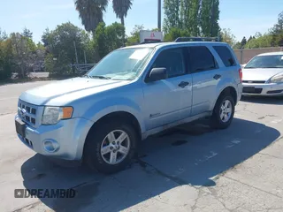 2009 Ford Escape Hybrid with VIN 1FMCU49319KB30484, listed as a IAAI auction lot 42160753 with 104,669 mi miles and . Bid and sale history available at DreamBid. Image 2.