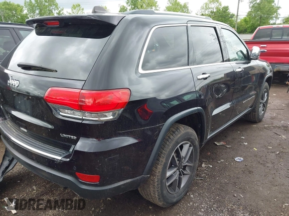 2019 Jeep Grand Cherokee Limited with VIN 1C4RJFBG1KC772977, listed as a IAAI auction lot 42242969 with 96,902 mi miles and . Bid and sale history available at DreamBid. Image 4.