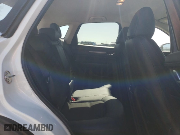 2018 Mazda CX-5 Touring z VIN JM3KFACM7J0370737, wystawiony jako Copart lot #60113725 z przebiegiem 131 385 mil mil oraz Szkoda całkowita • Salvage title. Historia ofert i sprzedaży dostępna na DreamBid. Obrazek 10.