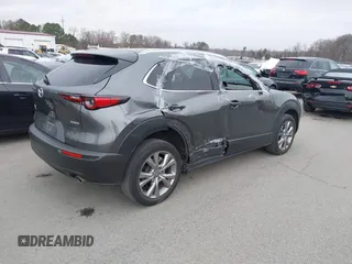 2022 Mazda CX-30 S Premium with VIN 3MVDMBDL9NM434619, listed as a IAAI auction lot 41620655 with 46,557 mi miles and . Bid and sale history available at carsss.com. Image 4.