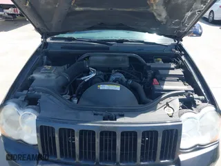 2010 Jeep Grand Cherokee Laredo with VIN 1J4PR4GK2AC104857, listed as a IAAI auction lot 42009569 with 131,986 mi miles. Bid and sale history available at carsss.com. Image 10.