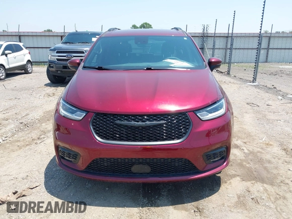 2023 Chrysler Pacifica Touring L with VIN 2C4RC1BG7PR513017, listed as a IAAI auction lot 42441272 with 23,310 mi miles and . Bid and sale history available at DreamBid. Image 12.