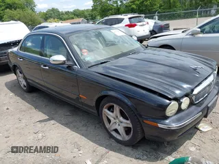 2005 Jaguar XJ Vanden Plas z VIN SAJWA82C95SG44576, wystawiony jako IAAI lot #42172253 z przebiegiem Nie podano mil oraz . Historia ofert i sprzedaży dostępna na DreamBid. Obrazek 1.