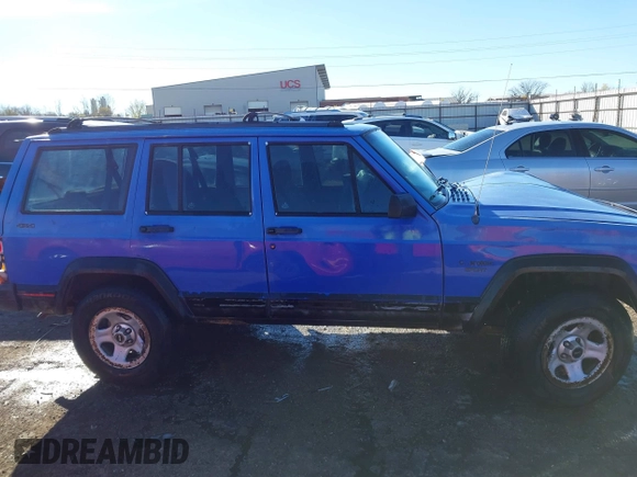 1996 Jeep Cherokee Sport with VIN 1J4FJ68S6TL171428, listed as a IAAI auction lot 40881632 with 323,289 mi miles. Bid and sale history available at carsss.com. Image 13.