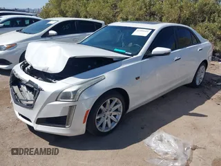 2015 Cadillac CTS with VIN 1G6AP5SX7F0139285, listed as a IAAI auction lot 41999355 with 34,709 mi miles and . Bid and sale history available at DreamBid. Image 2.