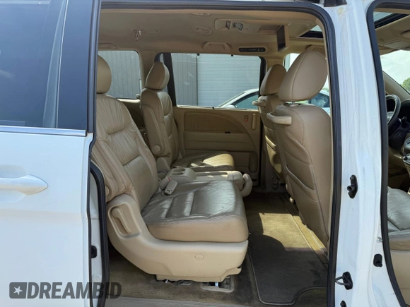 2010 Honda Odyssey Touring with VIN 5FNRL3H94AB047330, listed as a Copart auction lot 54064195 with 193,979 mi miles and Clean Title. Bid and sale history available at carsss.com. Image 6.
