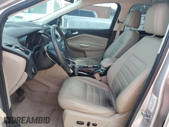 2015 Ford Escape Titanium z VIN 1FMCU0J97FUA14845, wystawiony jako Copart lot #58911445 z przebiegiem 110 437 mil mil oraz Szkoda całkowita • Salvage title. Historia ofert i sprzedaży dostępna na DreamBid. Obrazek 7.