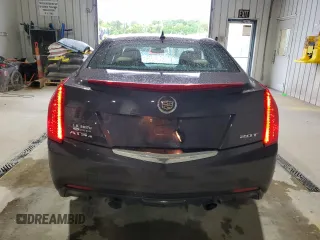 2014 Cadillac ATS Luxury AWD z VIN 1G6AH5RX0E0116304, wystawiony jako Copart lot #55971245 z przebiegiem 42 088 mil mil oraz Szkody całkowita. Historia ofert i sprzedaży dostępna na DreamBid. Obrazek 6.