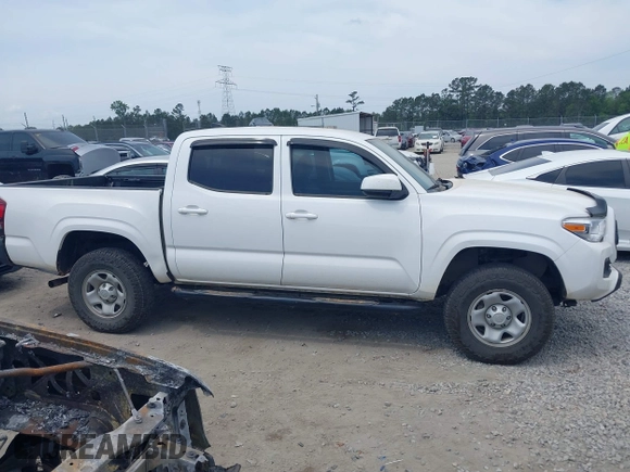 2022 Toyota Tacoma SR with VIN 3TYCZ5AN9NT098903, listed as a IAAI auction lot 42088505 with 93,000 mi miles and . Bid and sale history available at DreamBid. Image 13.