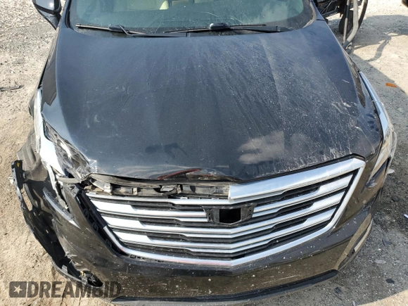 2017 Cadillac XT5 FWD with VIN 1GYKNARS0HZ283618, listed as a Copart auction lot 61640005 with 113,823 mi miles and Salvage title. Bid and sale history available at DreamBid. Image 12.