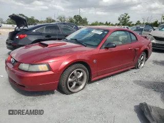 2004 Ford Mustang GT Deluxe z VIN 1FAFP42X64F174672, wystawiony jako Copart lot #59902025 z przebiegiem 83 386 mil mil oraz Szkoda całkowita • Salvage title. Historia ofert i sprzedaży dostępna na DreamBid. Obrazek 1.