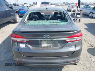 2018 Ford Fusion SE with VIN 3FA6P0HD2JR253714, listed as a IAAI auction lot 42059879 with 115,995 mi miles and . Bid and sale history available at DreamBid. Image 14.
