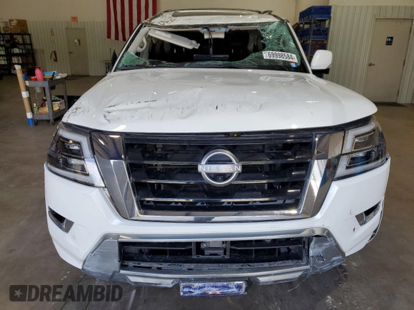 2022 Nissan Armada SL with VIN JN8AY2BCXN9160569, listed as a Copart auction lot 69998584 with 64,025 mi miles and Salvage Title. Bid and sale history available at carsss.com. Image 5.