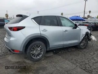 2017 Mazda CX-5 Touring with VIN JM3KFACL9H0183937, listed as a Copart auction lot 48861865 with 91,268 mi miles and Salvage Title. Bid and sale history available at carsss.com. Image 3.