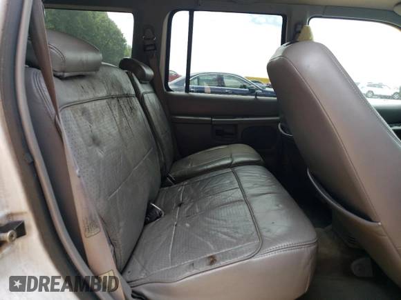 1997 Ford Explorer XL with VIN 1FMDU32E8VUC60285, listed as a Copart auction lot 66154644 with 219,066 mi miles and Salvage title. Bid and sale history available at DreamBid. Image 12.