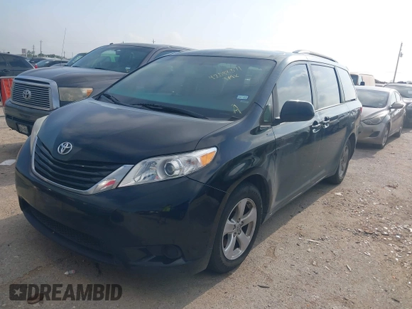 2017 Toyota Sienna LE Auto Access Seat with VIN 5TDKZ3DC7HS827068, listed as a IAAI auction lot 42088371 with 114,630 mi miles. Bid and sale history available at carsss.com. Image 2.