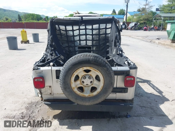 2006 Jeep Wrangler X with VIN 1J4FA39S36P703941, listed as a IAAI auction lot 42220361 with 148,829 mi miles and . Bid and sale history available at DreamBid. Image 16.