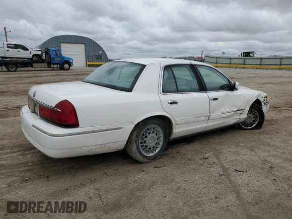 1999 Mercury Grand Marquis GS z VIN 2MEFM74W0XX670924, wystawiony jako Copart lot #51811055 z przebiegiem 176 559 mil mil oraz Szkoda całkowita • Salvage title. Historia ofert i sprzedaży dostępna na DreamBid. Obrazek 3.