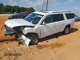 2019 GMC Yukon XL SLT z VIN 1GKS1GKCXKR240990, wystawiony jako Copart lot #54898595 z przebiegiem 123 218 mil mil oraz Szkoda całkowita • Salvage title. Historia ofert i sprzedaży dostępna na DreamBid. Obrazek 1.