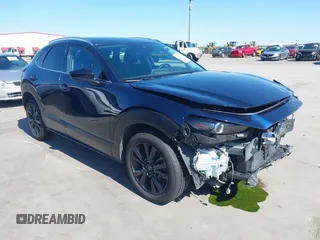 2021 Mazda CX-30 Premium with VIN 3MVDMBDYXMM307047, listed as a IAAI auction lot 41974966 with 53,409 mi miles and . Bid and sale history available at carsss.com. Image 1.