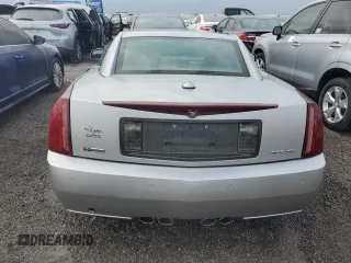 2004 Cadillac XLR z VIN 1G6YV34A545602056, wystawiony jako Copart lot #66506514 z przebiegiem Nie podano mil oraz Nie do naprawy. Historia ofert i sprzedaży dostępna na DreamBid. Obrazek 6.