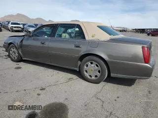 2002 Cadillac DeVille DHS z VIN 1G6KE57Y22U291523, wystawiony jako Copart lot #45711095 z przebiegiem 160 364 mil mil oraz Szkoda całkowita • Salvage title. Historia ofert i sprzedaży dostępna na DreamBid. Obrazek 2.