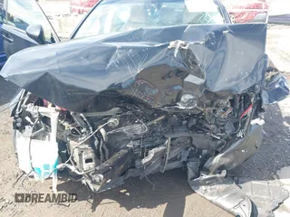 2014 Lexus ES 300h with VIN JTHBW1GG5E2066621, listed as a IAAI auction lot 42008057 with Not Provided miles and . Bid and sale history available at DreamBid. Image 6.