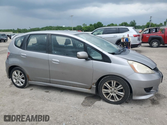 2009 Honda Fit Sport with VIN JHMGE88469S064405, listed as a Copart auction lot 61413745 with 179,497 mi miles and Salvage title. Bid and sale history available at DreamBid. Image 4.