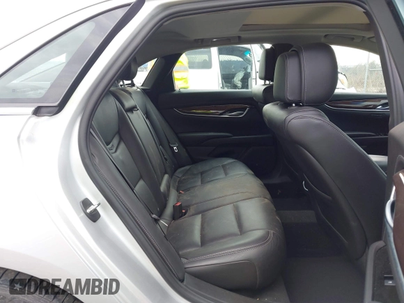 2013 Cadillac XTS Luxury with VIN 2G61P5S3XD9182910, listed as a IAAI auction lot 41940764 with 21,610 mi miles and . Bid and sale history available at DreamBid. Image 8.