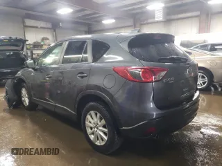 2014 Mazda CX-5 Sport z VIN JM3KE4BE2E0371864, wystawiony jako Copart lot #47225335 z przebiegiem 157 483 mil mil oraz Szkoda całkowita • Salvage title. Historia ofert i sprzedaży dostępna na DreamBid. Obrazek 2.