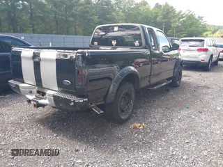 2001 Ford F-150 XLT z VIN 1FTRW08L91KE74815, wystawiony jako IAAI lot #42679387 z przebiegiem 201 258 mil mil oraz . Historia ofert i sprzedaży dostępna na DreamBid. Obrazek 4.