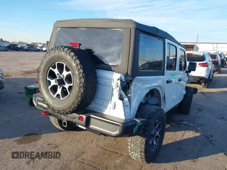 2022 Jeep Wrangler Unlimited Rubicon with VIN 1C4HJXFN4NW123803, listed as a IAAI auction lot 40994742 with 36,156 mi miles and . Bid and sale history available at DreamBid. Image 4.