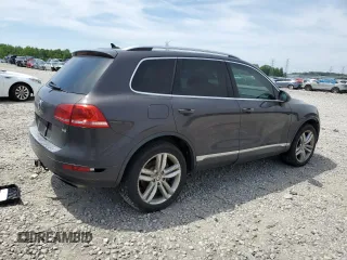 2013 Volkswagen Touareg Lux with VIN WVGEF9BP8DD002947, listed as a Copart auction lot 52590164 with 144,831 mi miles and Salvage Title. Bid and sale history available at DreamBid. Image 3.