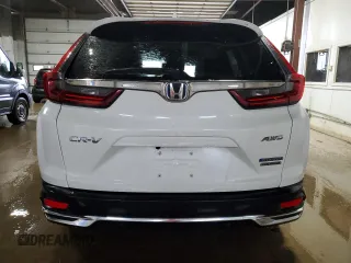 2021 Honda CR-V Touring z VIN 7FART6H97ME005163, wystawiony jako Copart lot #57688485 z przebiegiem 79 137 mil mil oraz Szkoda całkowita • Salvage title. Historia ofert i sprzedaży dostępna na DreamBid. Obrazek 6.