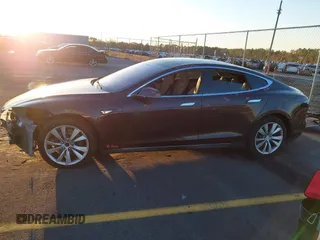 2013 Tesla Model S with VIN 5YJSA1CN7DFP22690, listed as a IAAI auction lot 40981089 with 188,057 mi miles. Bid and sale history available at carsss.com. Image 15.