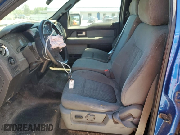 2012 Ford F-150 XL with VIN 1FTFW1EF0CFB32432, listed as a Copart auction lot 57933145 with 169,099 mi miles and Salvage title. Bid and sale history available at DreamBid. Image 7.
