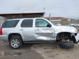 2013 GMC Yukon SLT with VIN 1GKS2CE07DR315820, listed as a IAAI auction lot 41653433 with 137,491 mi miles. Bid and sale history available at carsss.com. Image 13.