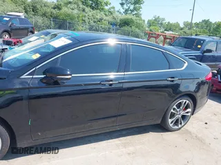 2017 Ford Fusion Titanium with VIN 3FA6P0K9XHR117300, listed as a IAAI auction lot 42731703 with 47,276 mi miles and . Bid and sale history available at DreamBid. Image 14.
